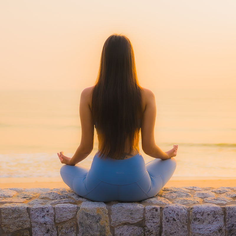 Sunset Yoga on the Yacht. Meditation and Yoga Practicing at Sunset